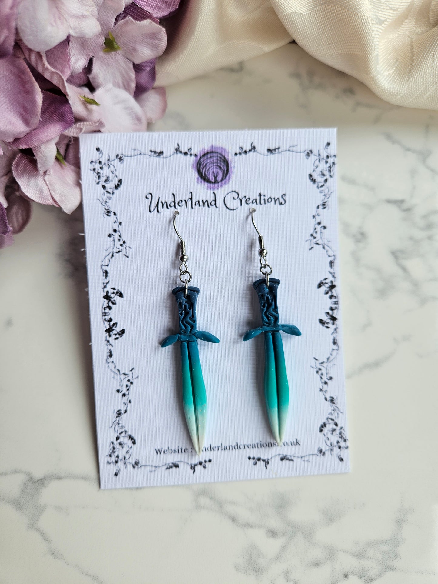 "Sting" Sword Earrings in "Ice"