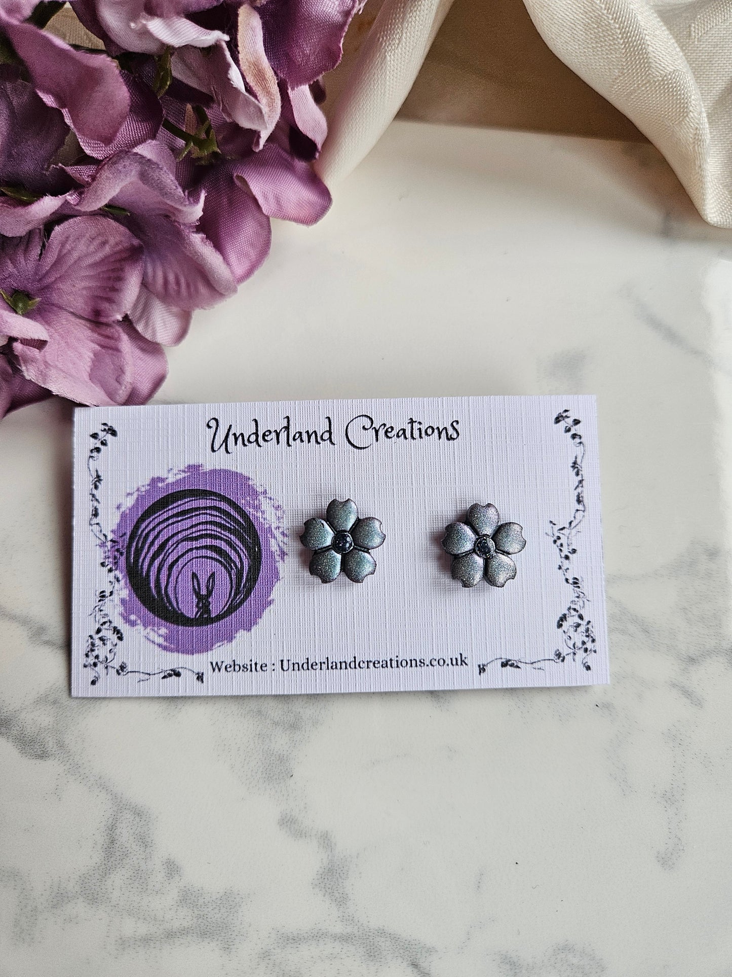 Metallic Silver/Blue Flower Studs