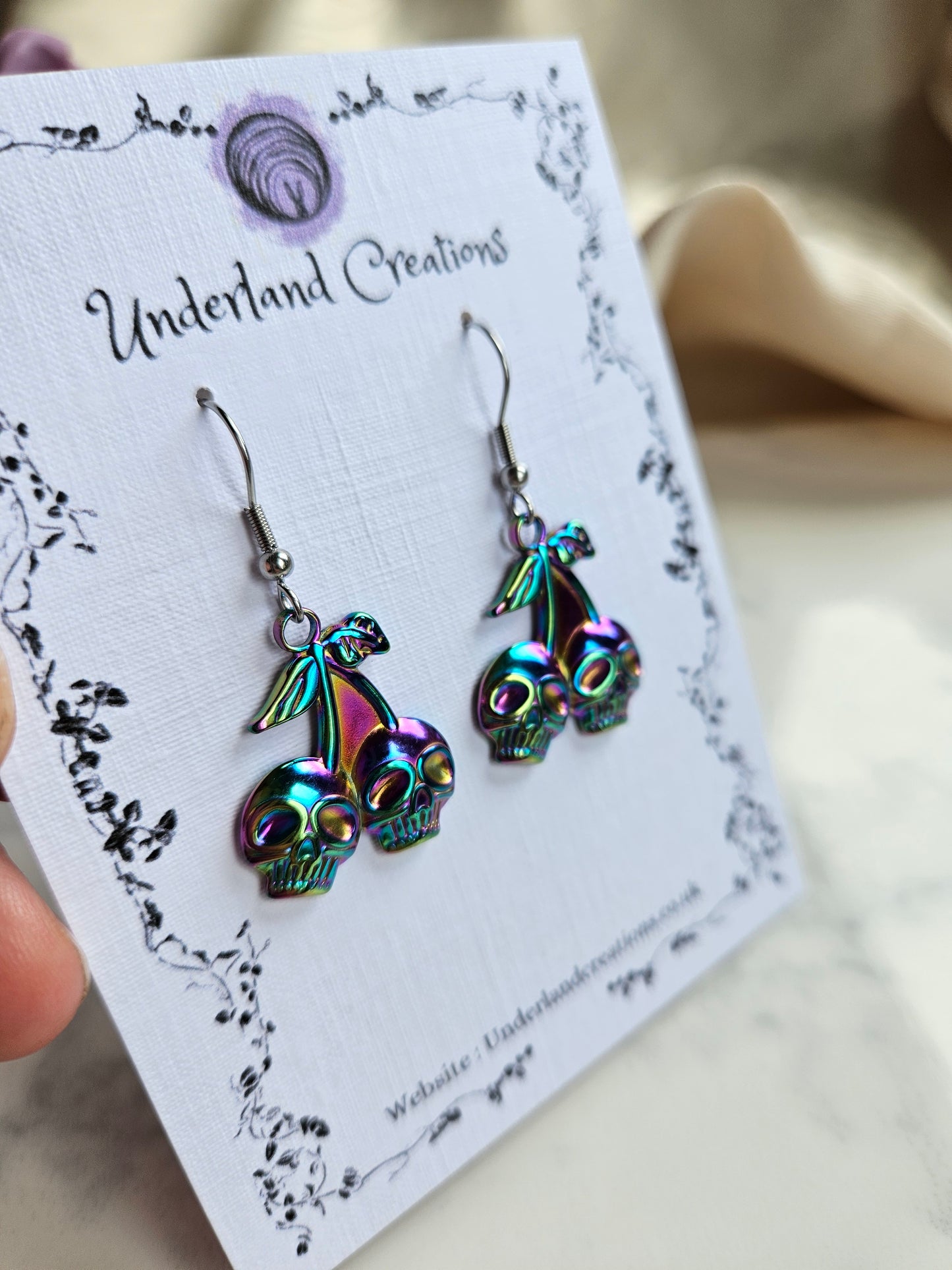 Rainbow Steel Skull Cherry Earrings