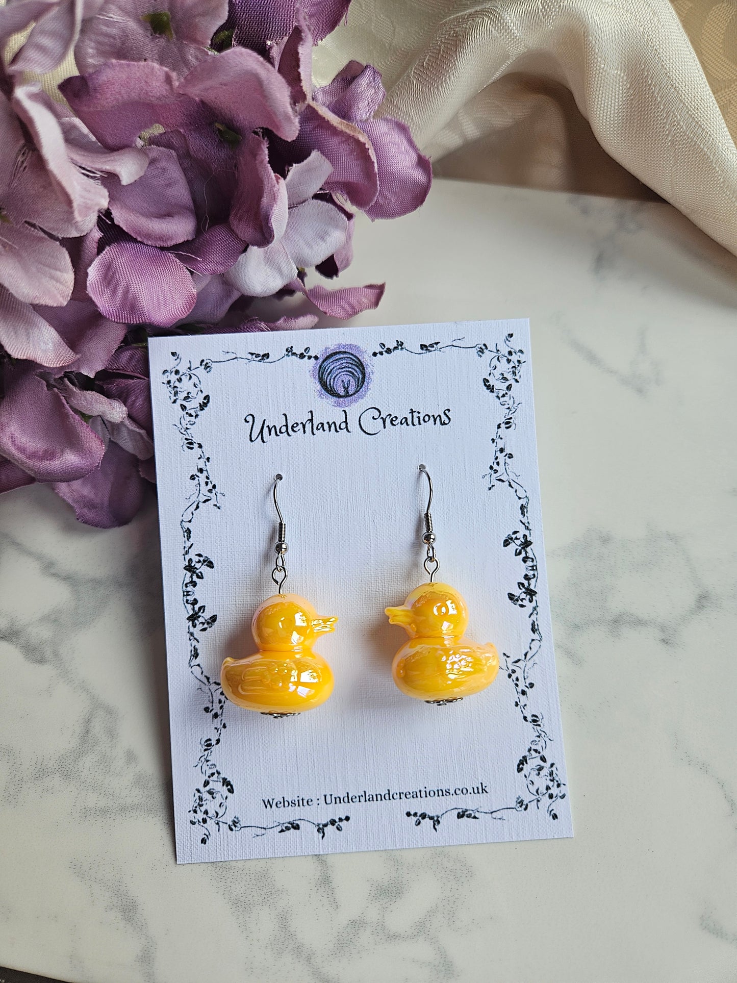 UV Plated Acrylic Duck Earrings