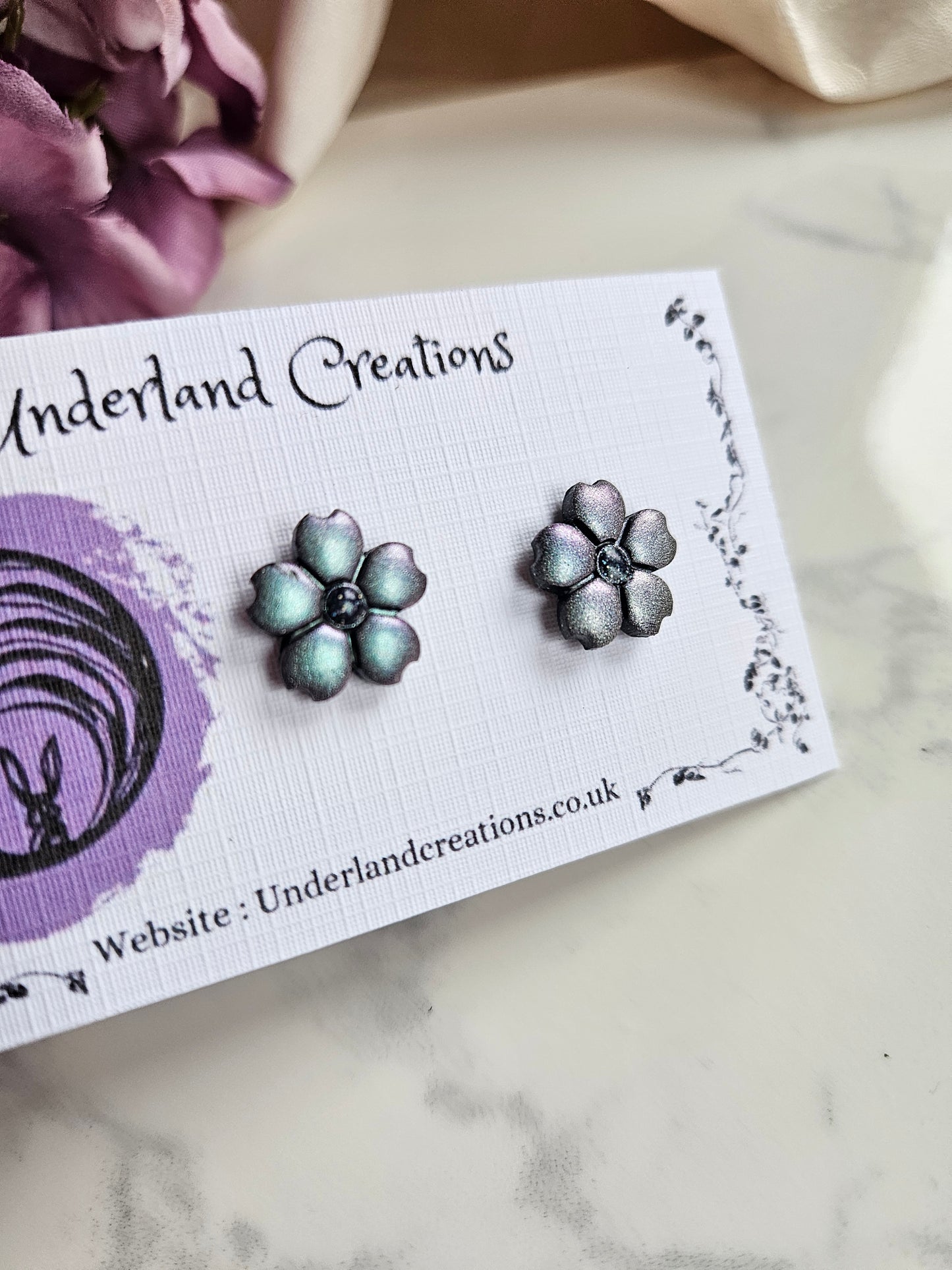 Metallic Silver/Blue Flower Studs