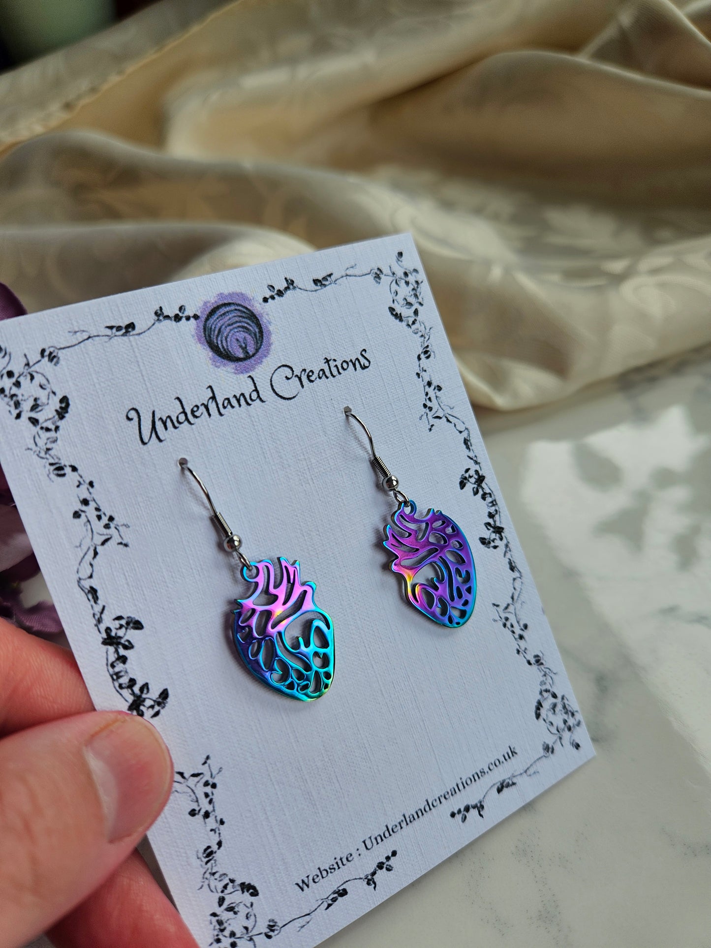 Rainbow Steel Anatomical Heart Earrings