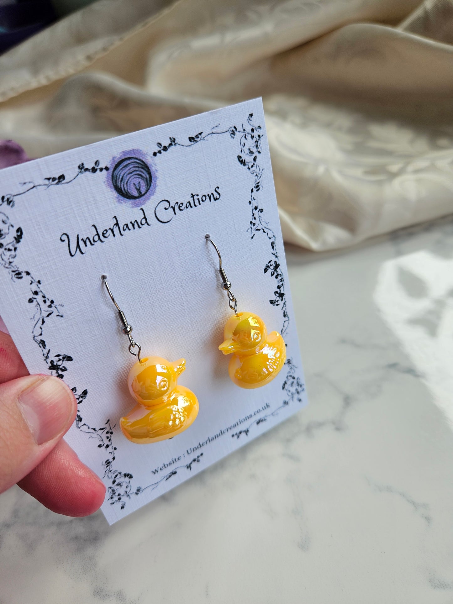 UV Plated Acrylic Duck Earrings