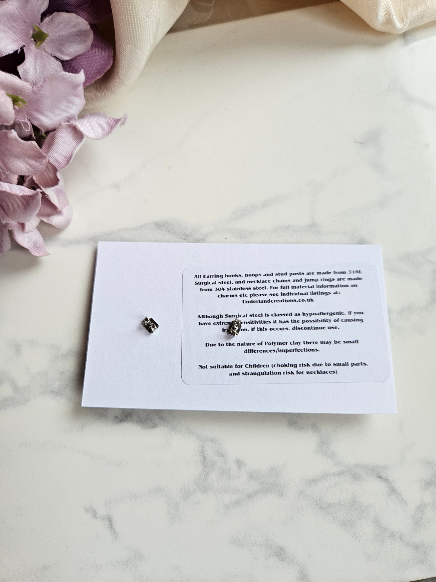 Skull Stud Earrings in "White Sparkles"
