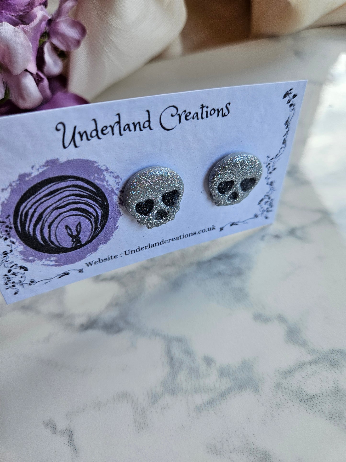 Skull Stud Earrings in "T.I.T.S.O.A.K."