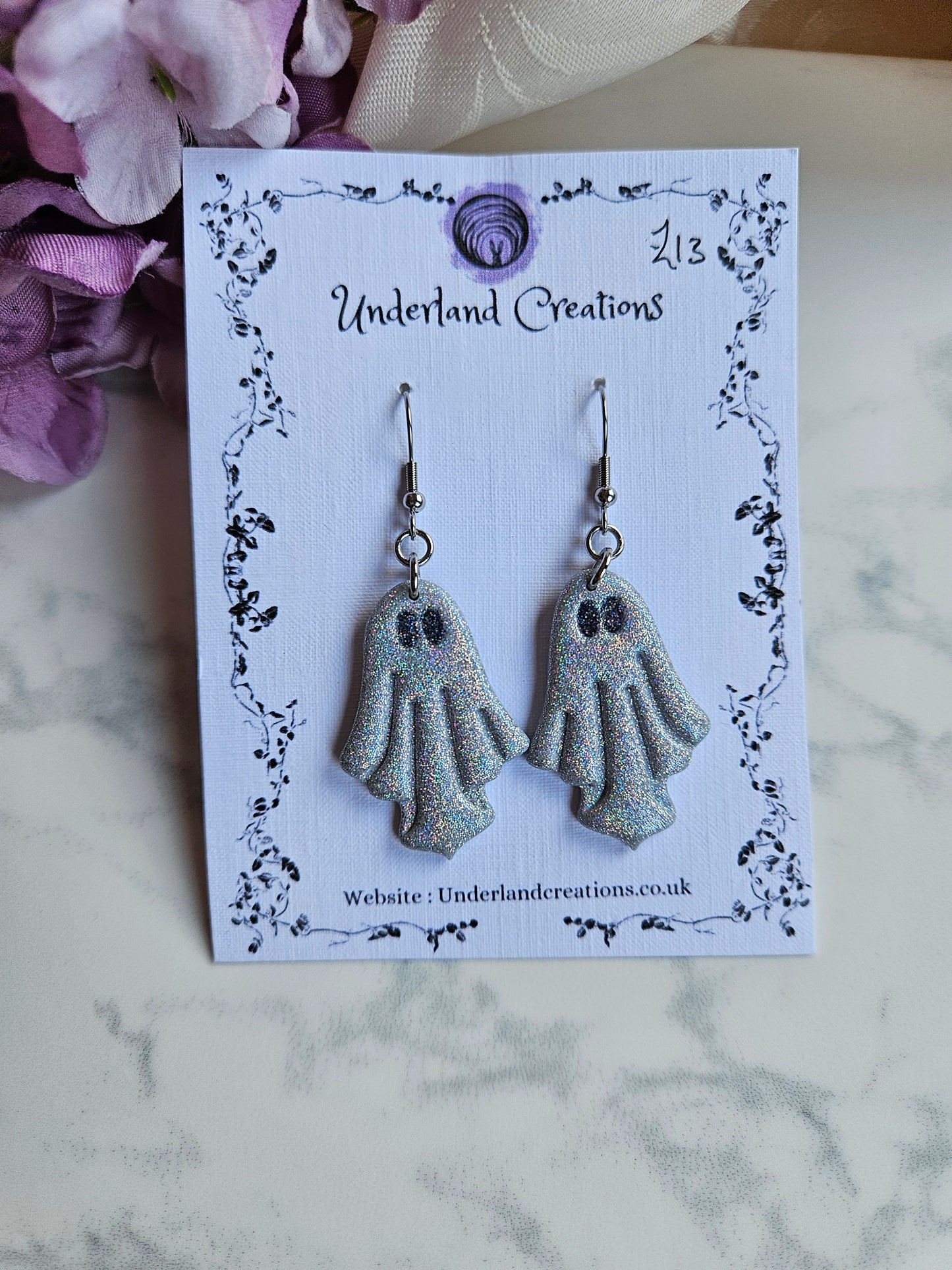 Ghost Earrings in "T.I.T.S.O.A.K."