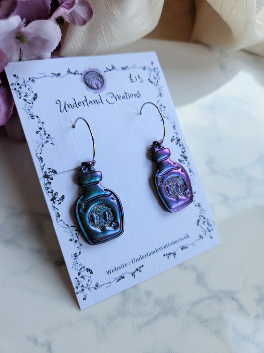 Skull Potion Bottles in Metallic Purple/Blue