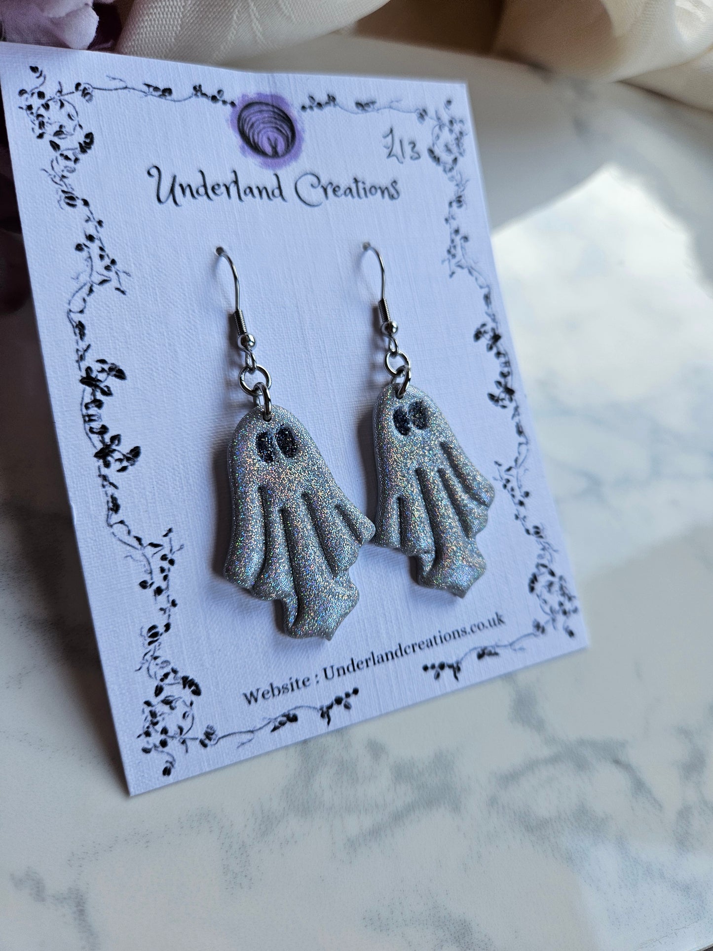 Ghost Earrings in "T.I.T.S.O.A.K."