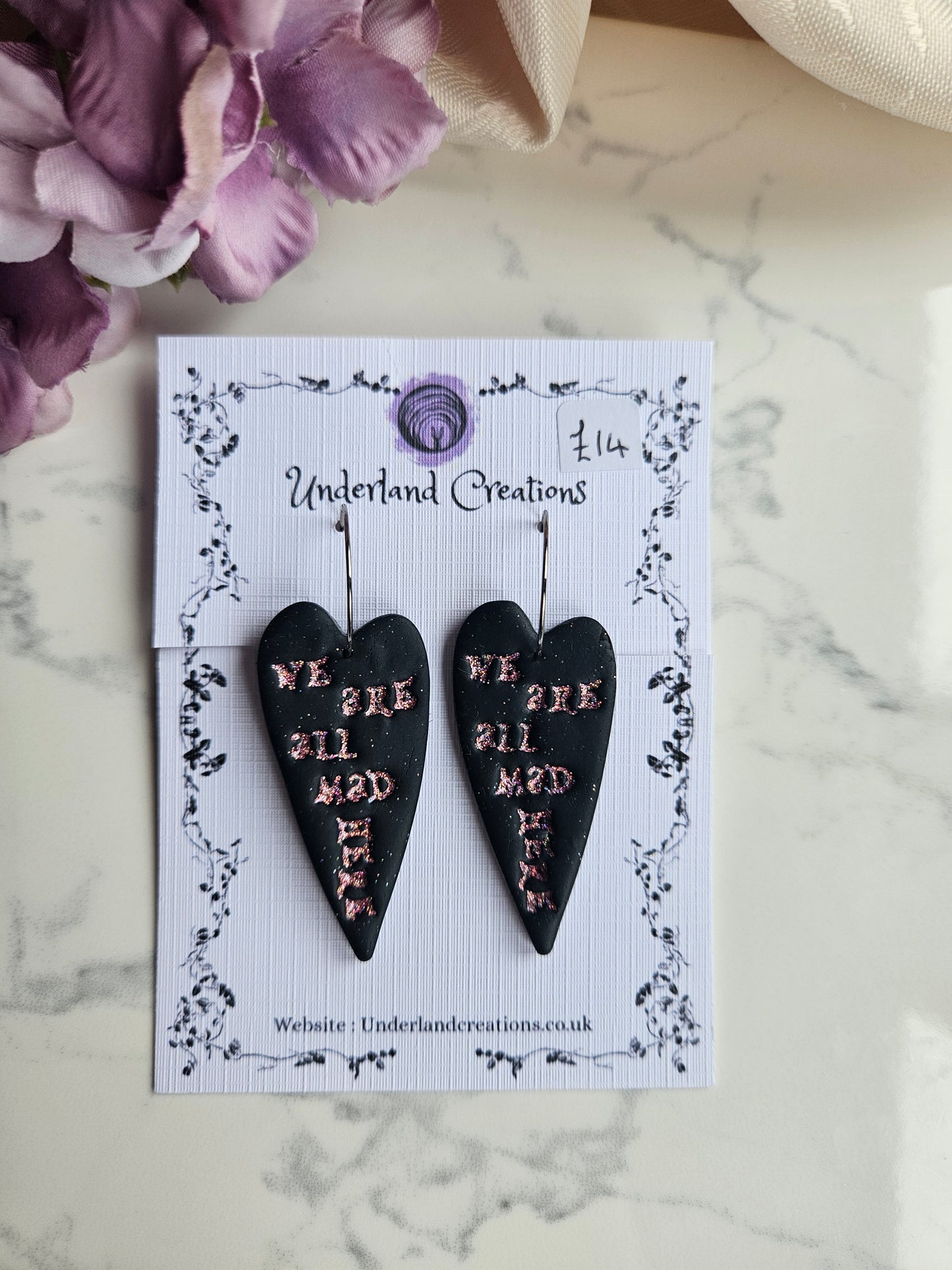 We're All Mad Here Earrings in "Black with Pink Sparkles"